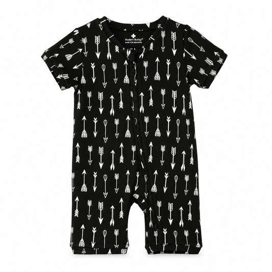 Organic Baby Short Sleeve Zip Romper | Signature Prints in White on Black Arrows, studio product photo on white.