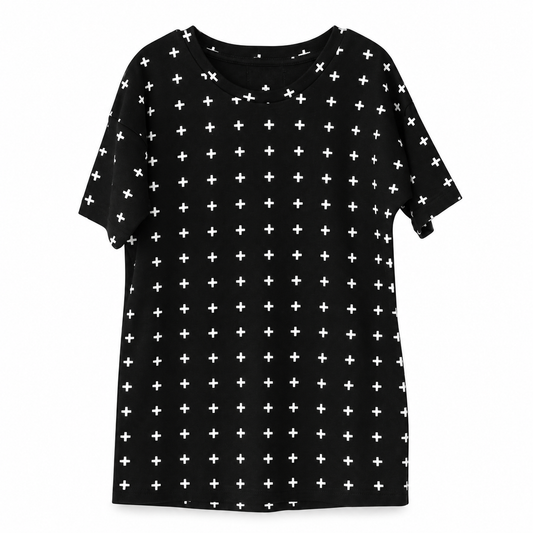Organic Kids Slouch Dress | White-on-Black Signature Prints in White on Black Swiss Cross, studio product photo on white.