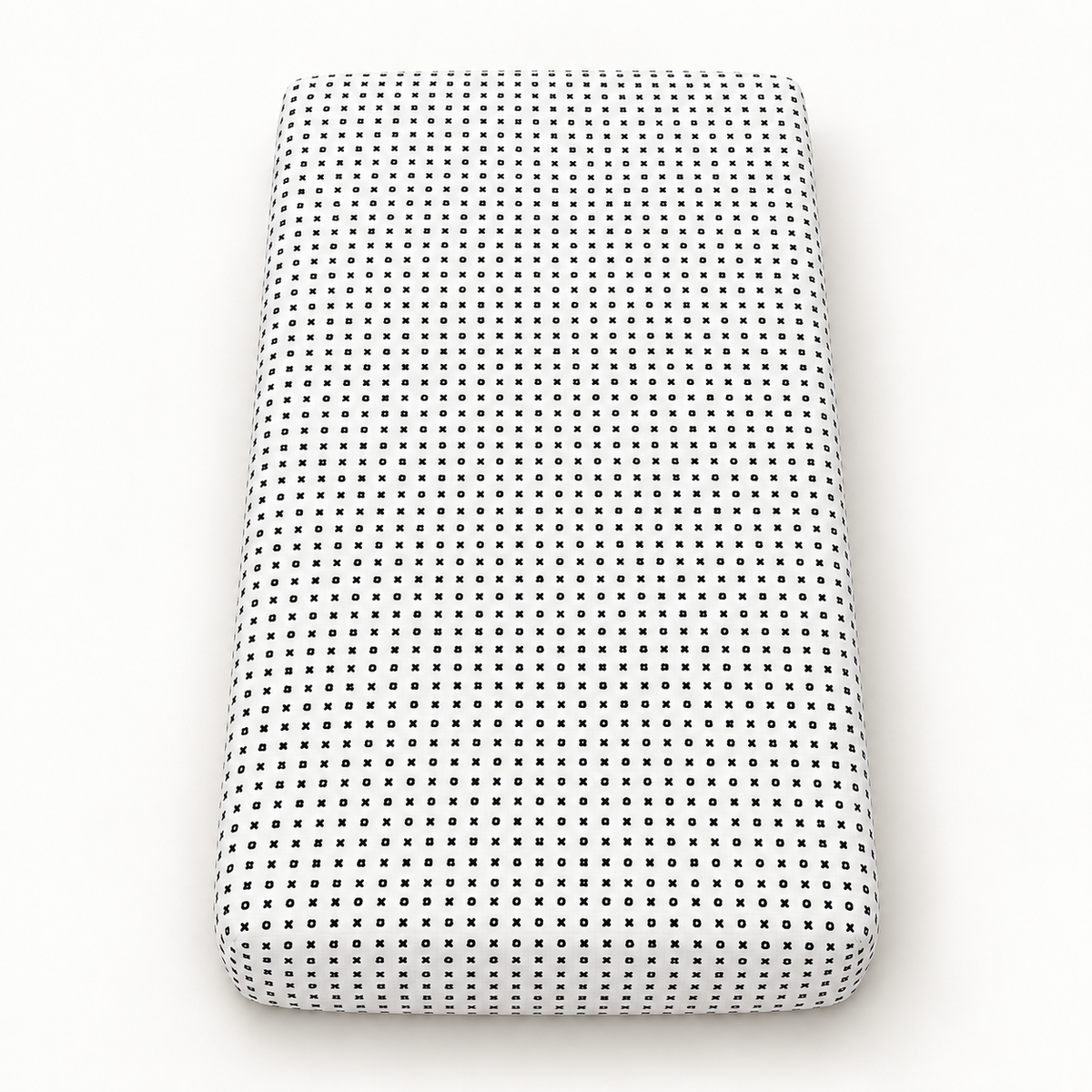 XO organic crib sheet shown fully fitted on a mattress against a white background