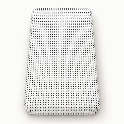 XO organic crib sheet shown fully fitted on a mattress against a white background