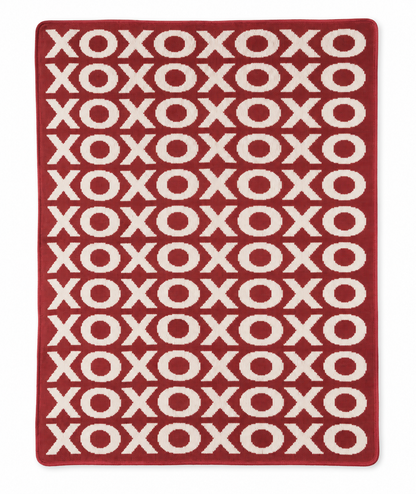 Rust Red XO recycled cotton knit blanket, full front studio view on white.
