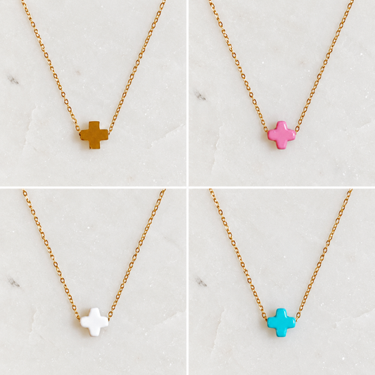So Very Blessed cross necklaces in Gold, Pink, White and Blue. Sold separately.