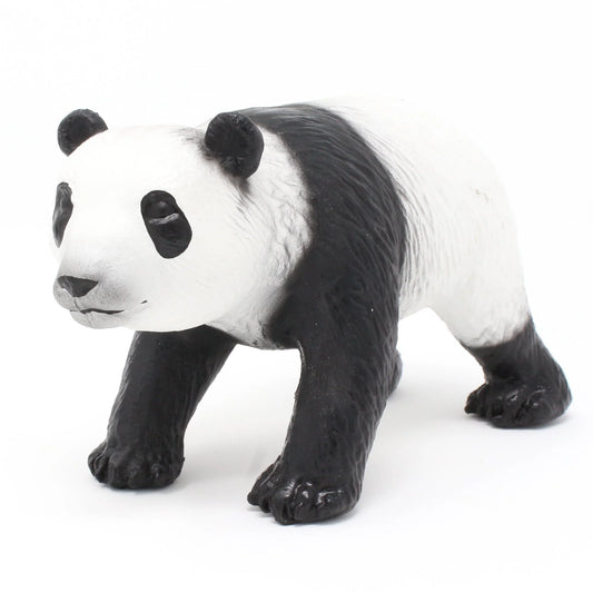 Hand-painted natural rubber panda bear toy, three-quarter side view on white.
