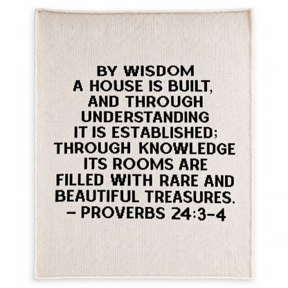 Proverbs 24:3-4 recycled cotton throw — Natural ivory studio flat lay showing full black scripture lettering