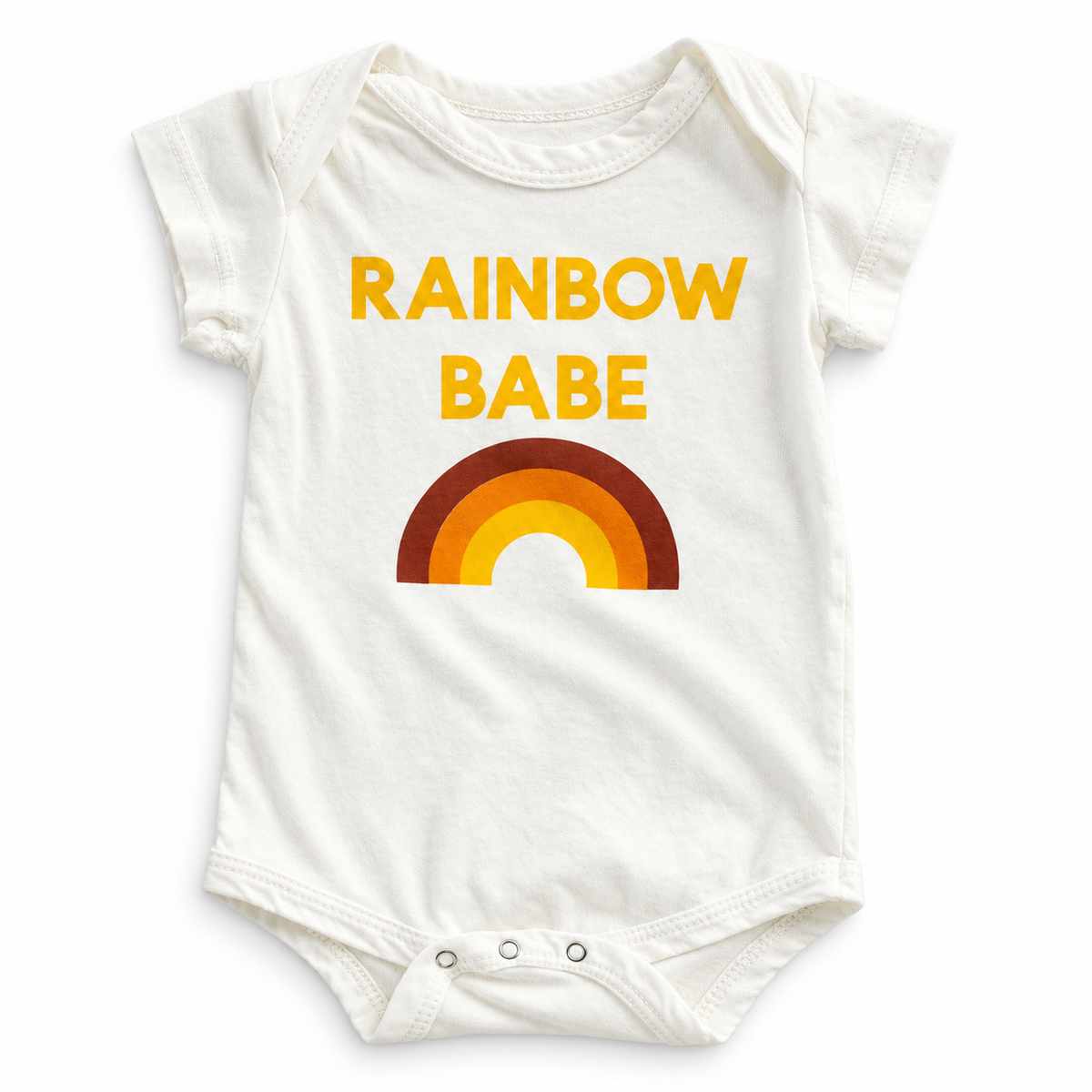 Ivory Rainbow Babe organic cotton bodysuit with yellow lettering, a red, orange and yellow rainbow, short sleeves and three bottom snaps.