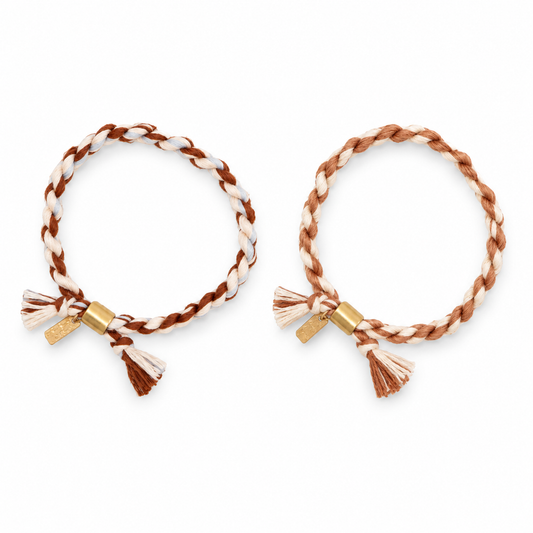 Hand-spun rope bracelets in Brown + Blue and Brown, sold separately.