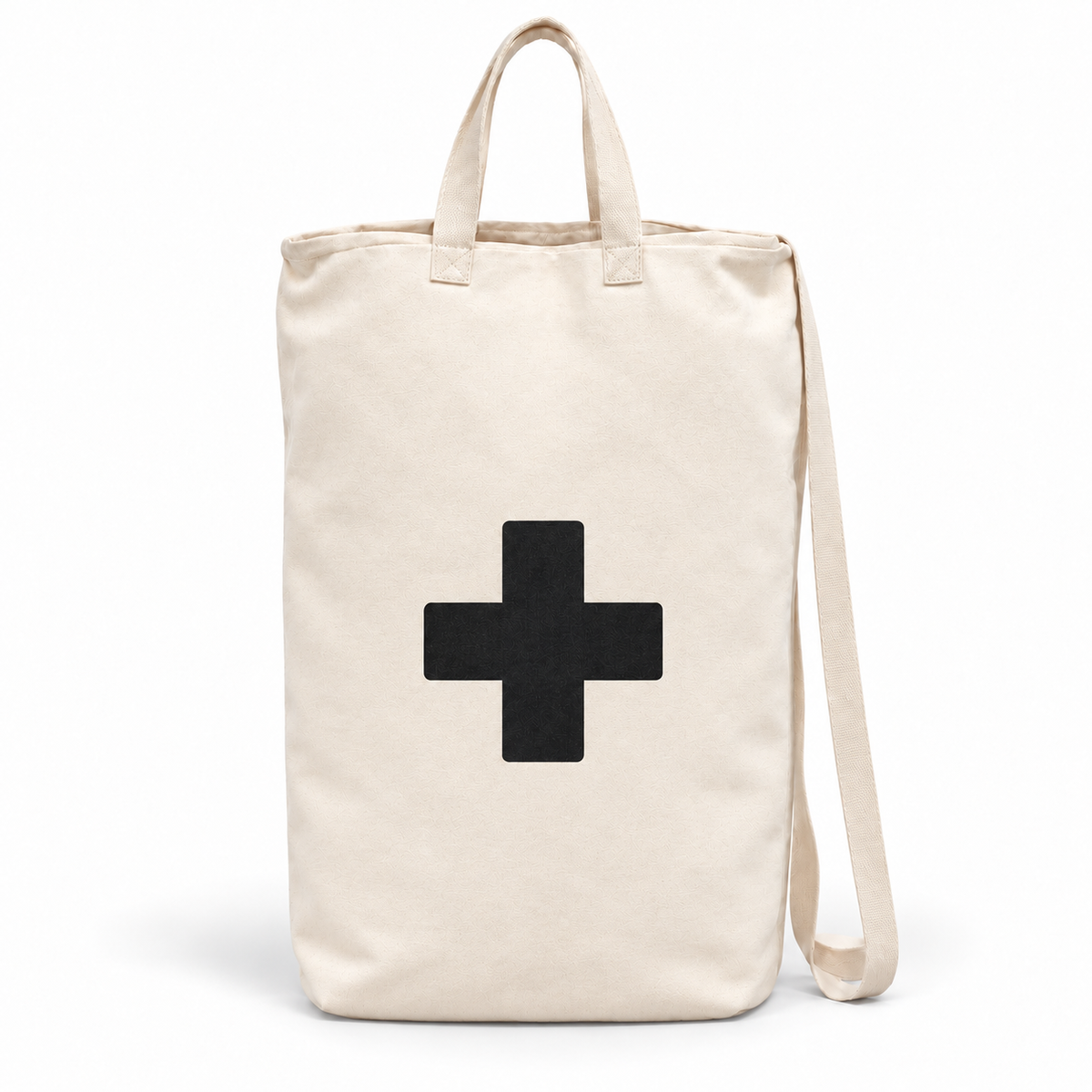 Single Cross ivory cotton canvas bag with black cross, handles and shoulder strap on white