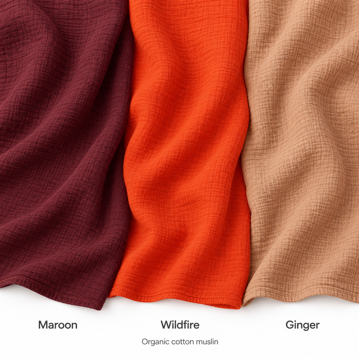 Labeled color comparison: Maroon, Wildfire and Ginger organic cotton muslin, showing crinkled texture and stitched hems.
