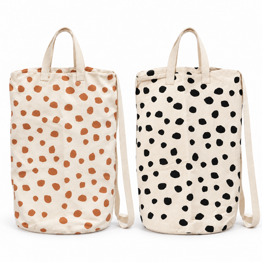 Ginger and Black Spots canvas laundry bags shown together at matching scale on white; bags sold individually