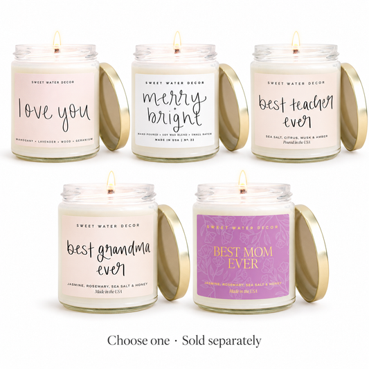 All five 9 oz Sweet Water Decor candle choices: Love You, Merry + Bright, Best Teacher Ever, Best Grandma Ever and Best Mom Ever. Choose one; sold separately.