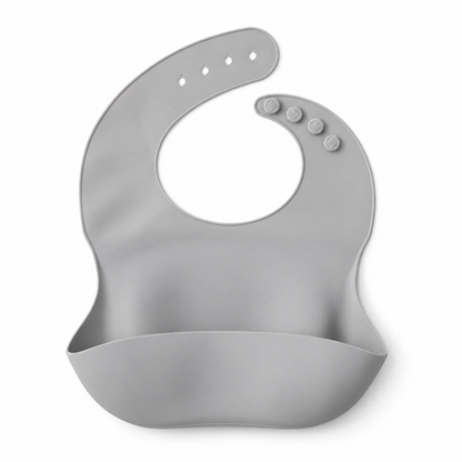 The Saturday Baby silicone bib in Sage on white, front studio view.