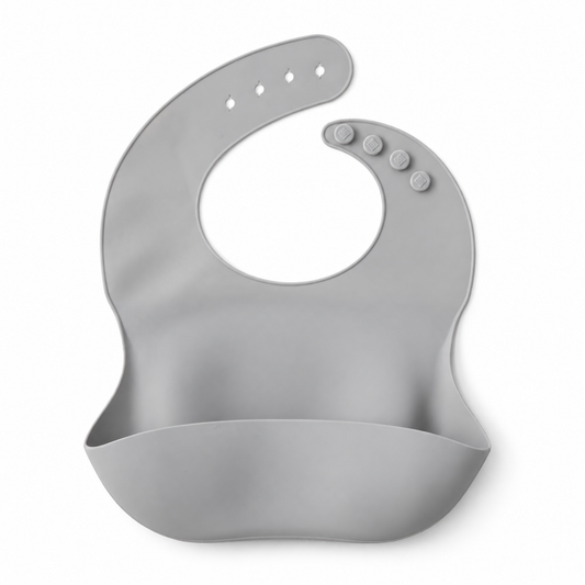 The Saturday Baby silicone bib in Sage on white, front studio view.