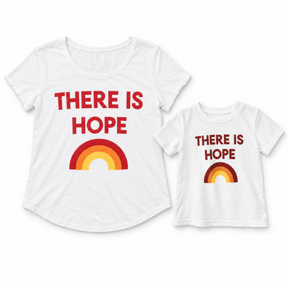 There Is Hope adult and kids' tees together in a studio flat lay; each tee sold separately.