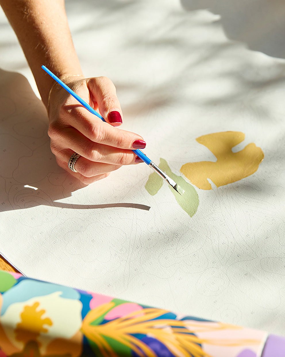 In Bloom paint-by-numbers canvas being painted