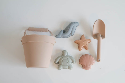 Complete six-piece silicone beach set: bucket, shovel and four sea-life molds