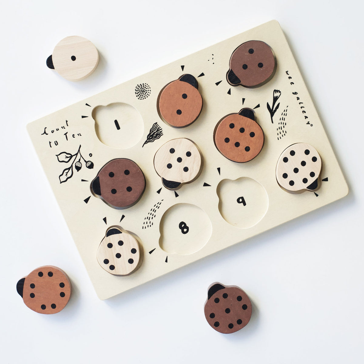 Count to 10 Ladybugs wooden puzzle with numbered spaces revealed