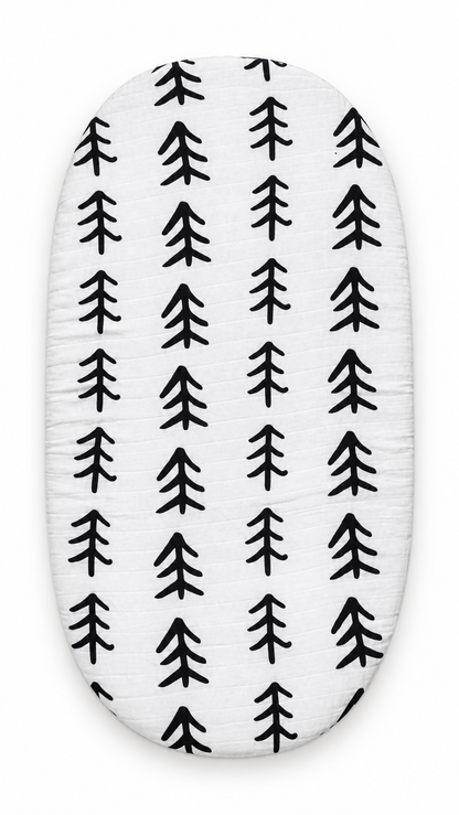 Tree Hugger organic muslin bassinet and small changing pad sheet, fitted product view. Sheet sold separately; pad not included.