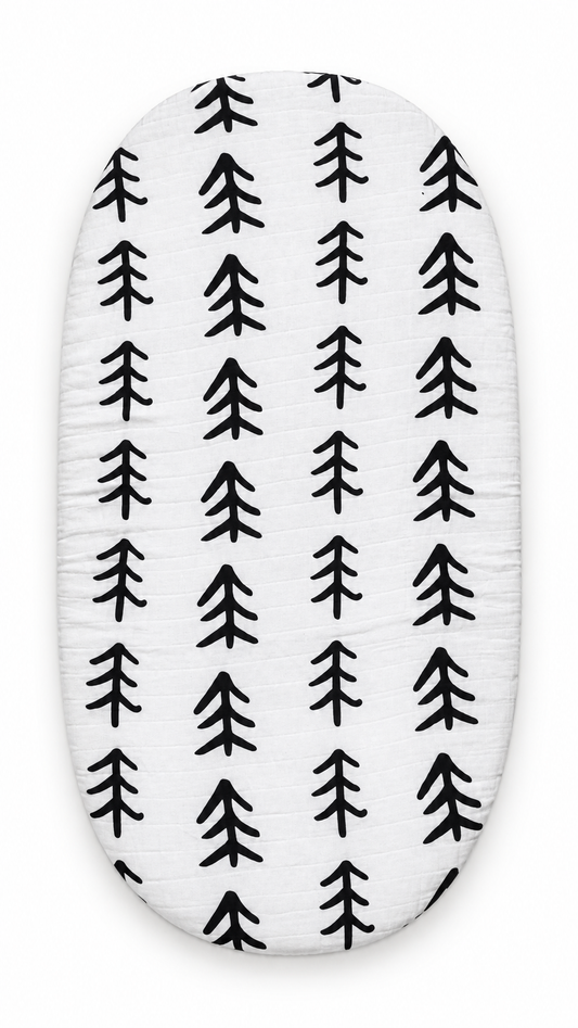 Tree Hugger organic muslin bassinet and small changing pad sheet, fitted product view. Sheet sold separately; pad not included.