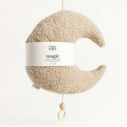Cream Magic Moon music box with teddy texture and wooden pull ring.