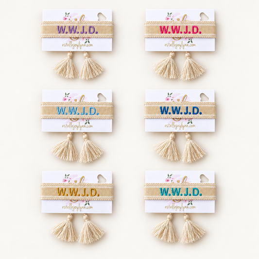 WWJD tassel bracelets in Lavender, Bright Pink, Light Blue, Medium Blue, Gold and Teal. Sold separately.