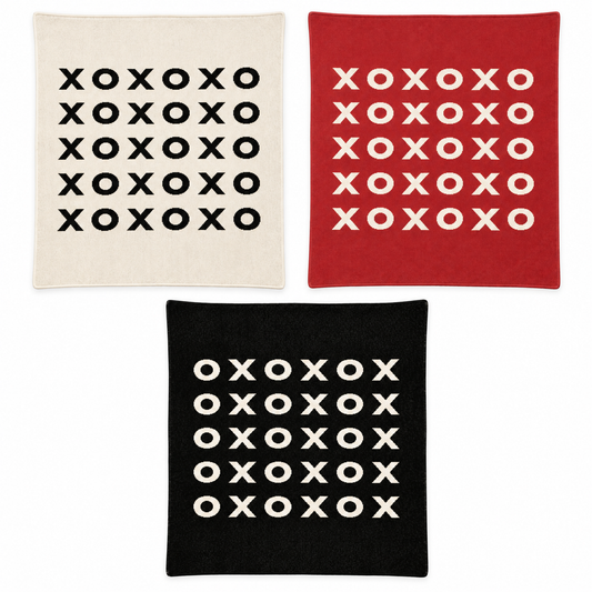XO throw blanket in Natural, Rust Red and Black at matching scale. Each sold separately; availability varies by size.