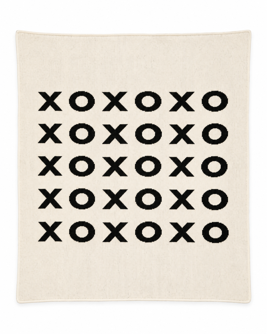 XO throw blanket in Natural, full studio view on white.