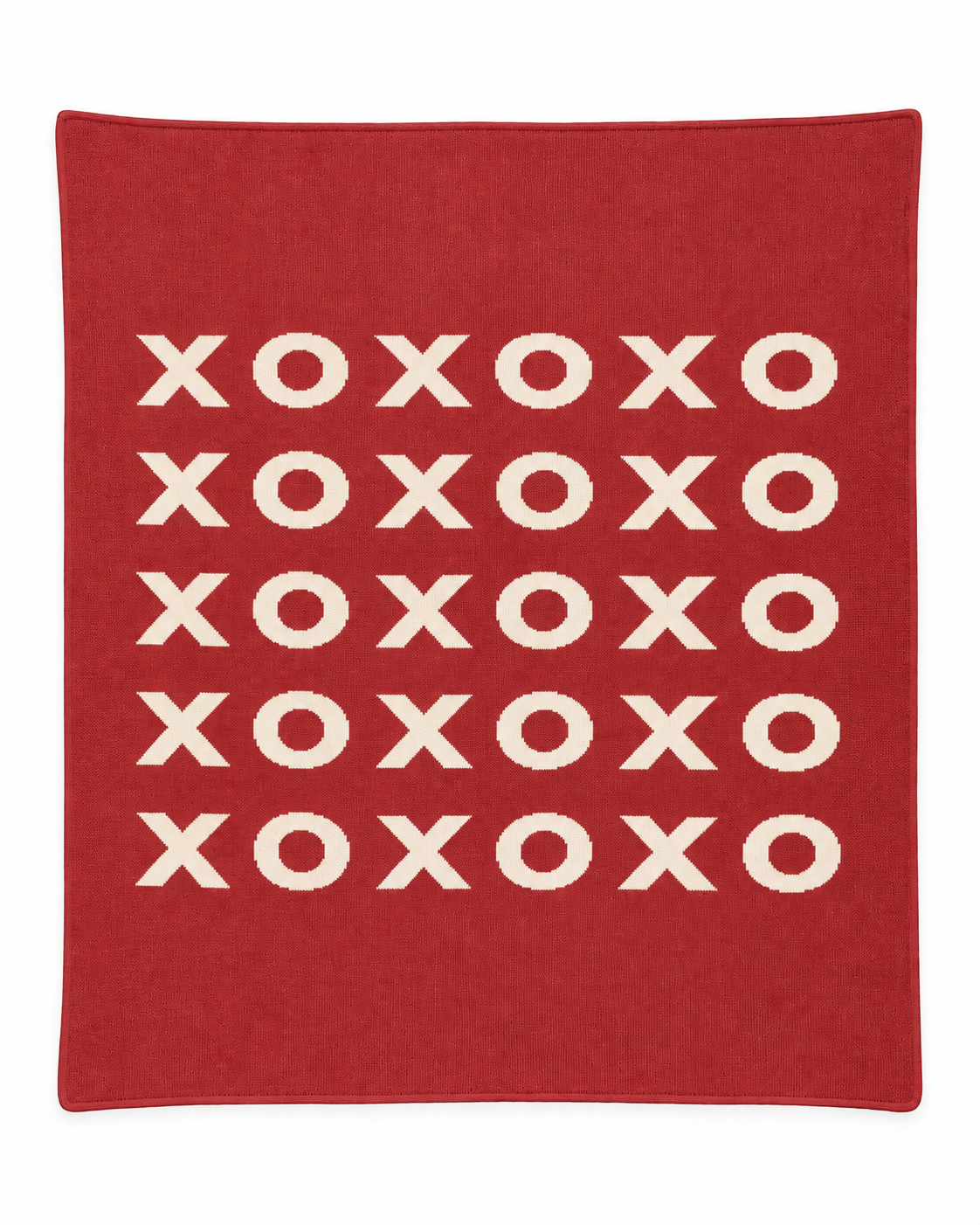 XO throw blanket in Rust Red, full studio view on white.