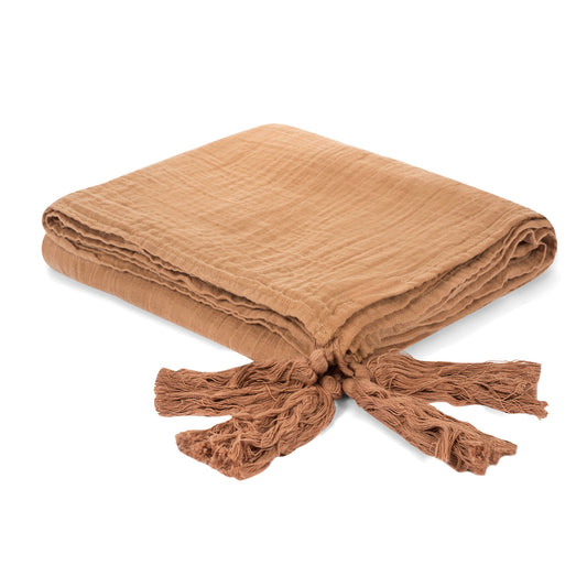 Folded ginger organic cotton muslin XL throw blanket with tassels