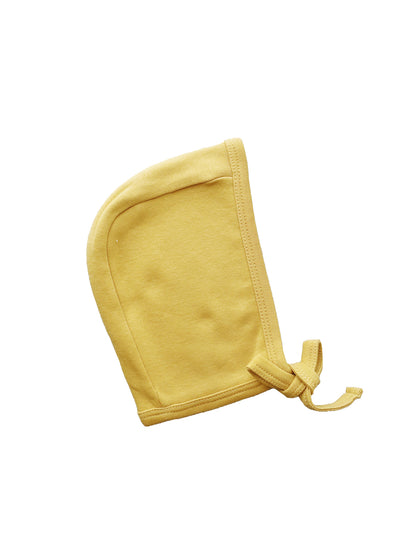 Mustard Organic Baby Bonnet — product photograph.