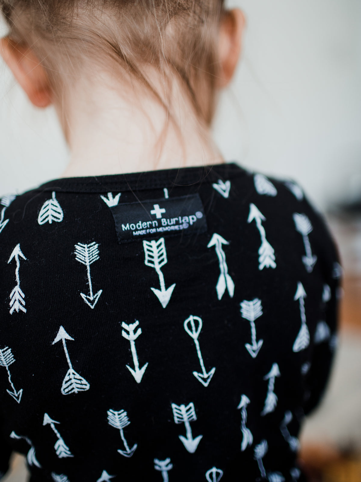 Organic Baby + Kids Pajama Set | White on Black Arrows — Back neckline and arrow print detail