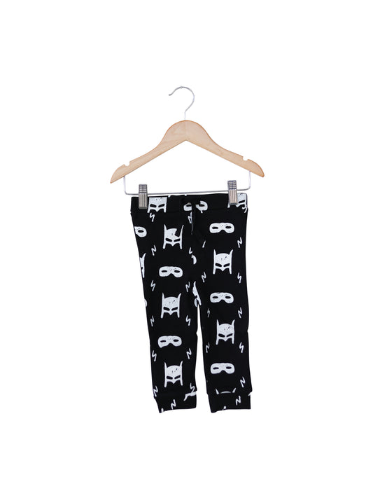 White on Black Hero Struck Organic Baby + Kids Faux Drawstring Pants — product photograph.