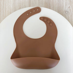 
                  
                    Load image into Gallery viewer, Little Eli - Silicone Bibs - Copper Clay
                  
                