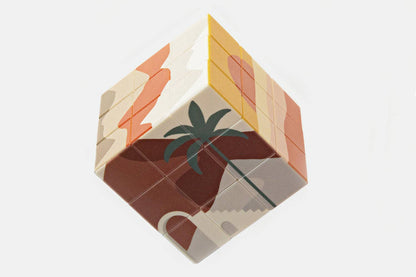 Journey Of Something Desert Art Cube showing its geometric illustrated faces.