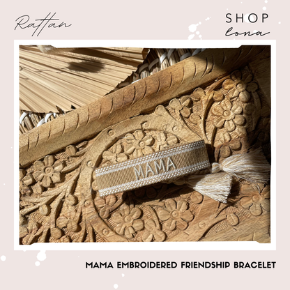shop LONA MAMA embroidered bracelet in Rattan, shown with its neutral band and tassel ends.