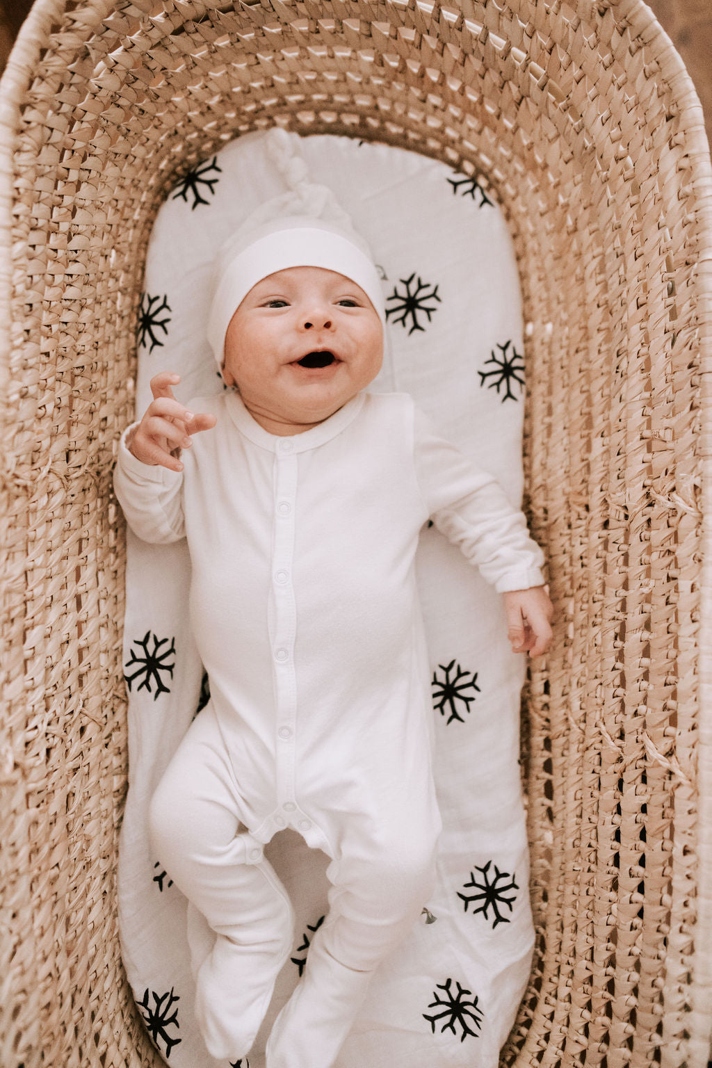 Snowflakes organic cotton muslin swaddle by Modern Burlap