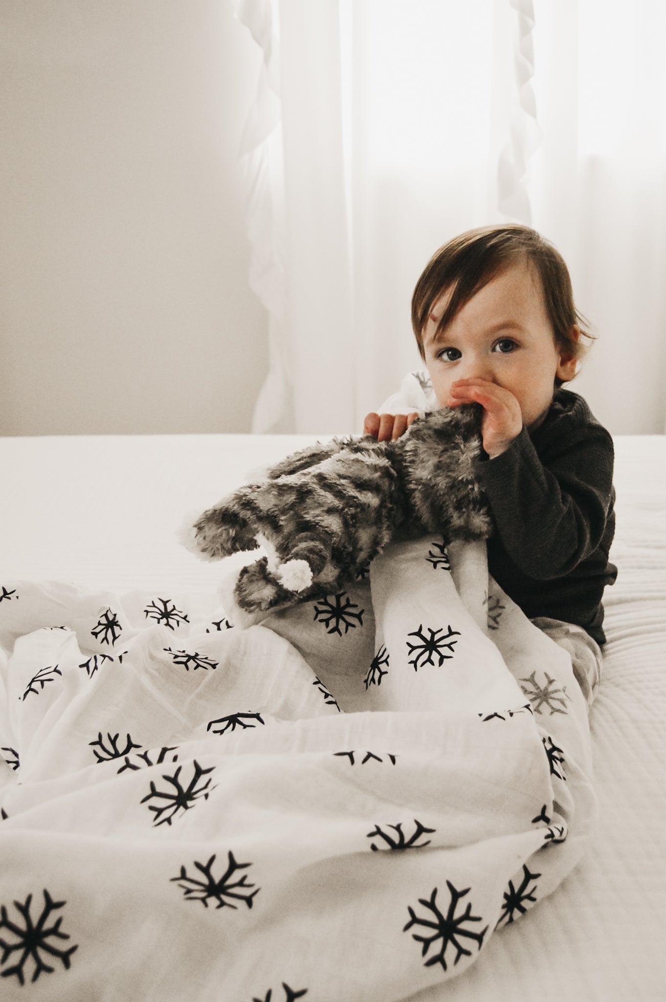 Snowflakes organic cotton muslin swaddle by Modern Burlap
