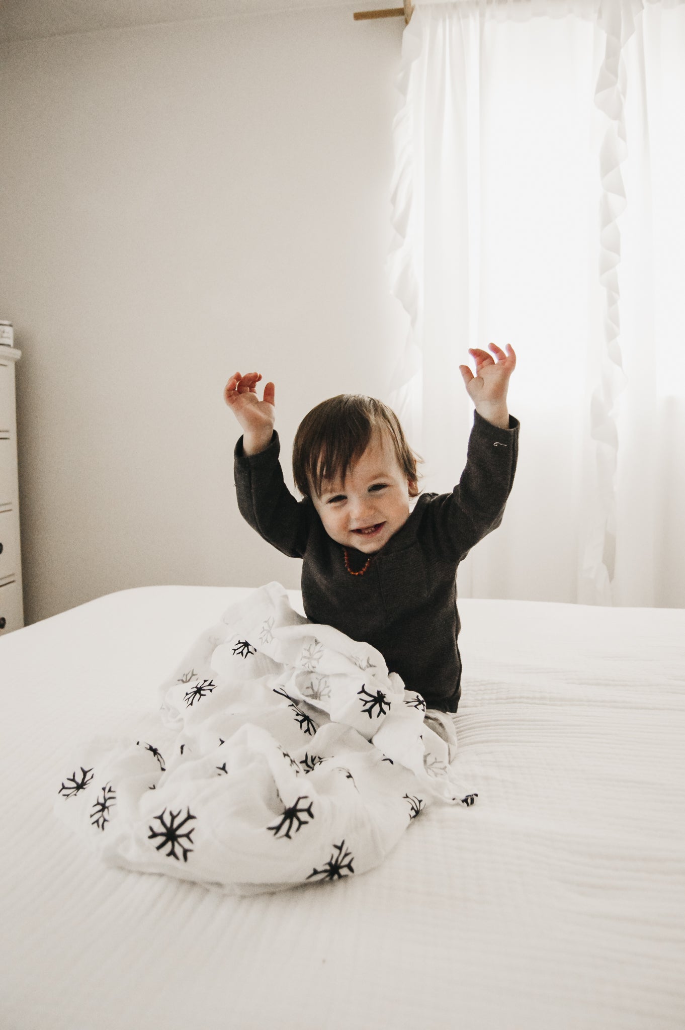 Snowflakes organic cotton muslin swaddle by Modern Burlap