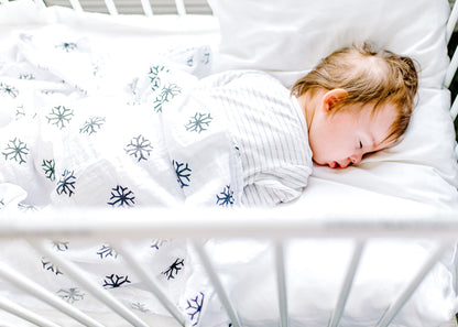 Snowflakes organic cotton muslin swaddle by Modern Burlap