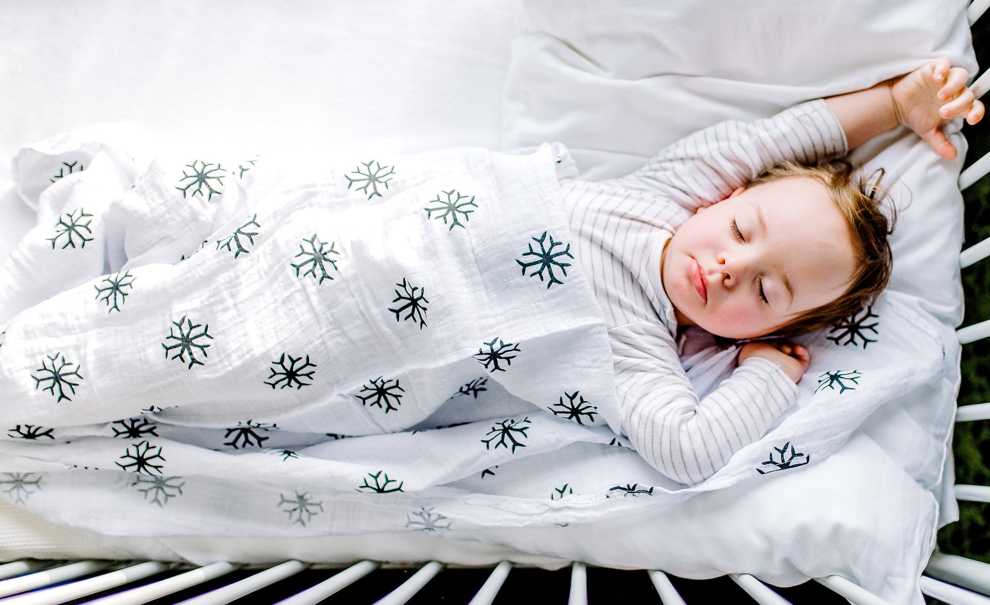 Snowflakes organic cotton muslin swaddle by Modern Burlap