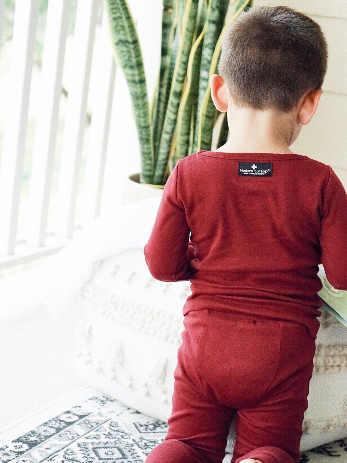 Organic Baby + Kids Pajama Set | Maroon — Back view of child wearing the set