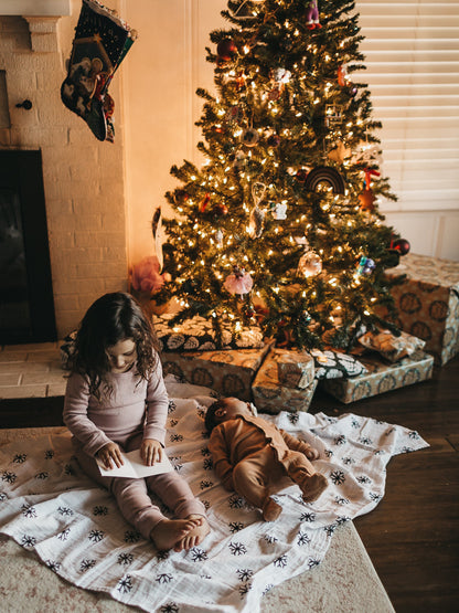Snowflakes organic cotton muslin swaddle by Modern Burlap