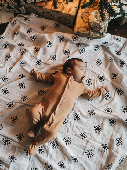 Snowflakes organic cotton muslin swaddle by Modern Burlap