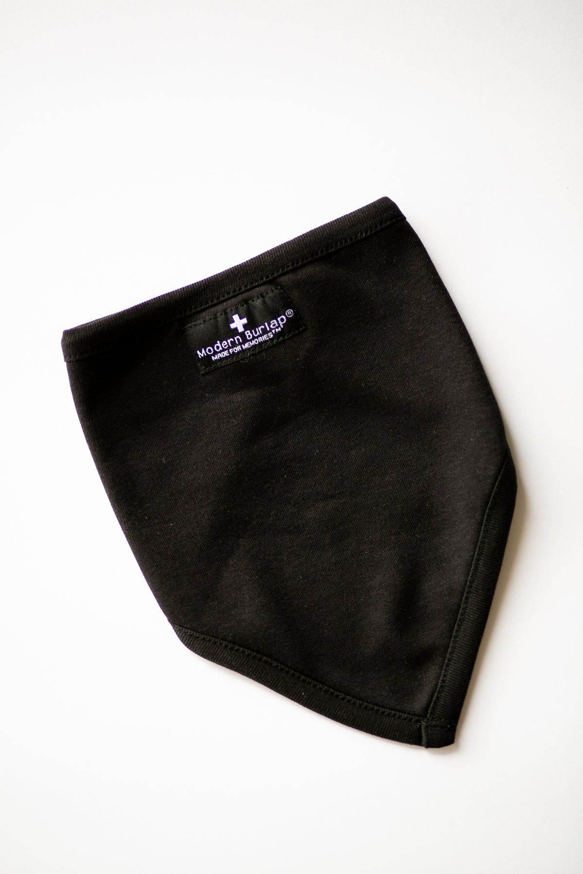 Black Organic Bibdana — product photograph.