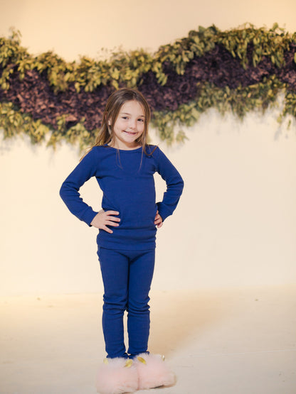 Organic Baby + Kids Pajama Set | Navy Peony — Full-length front view of child wearing navy pajamas