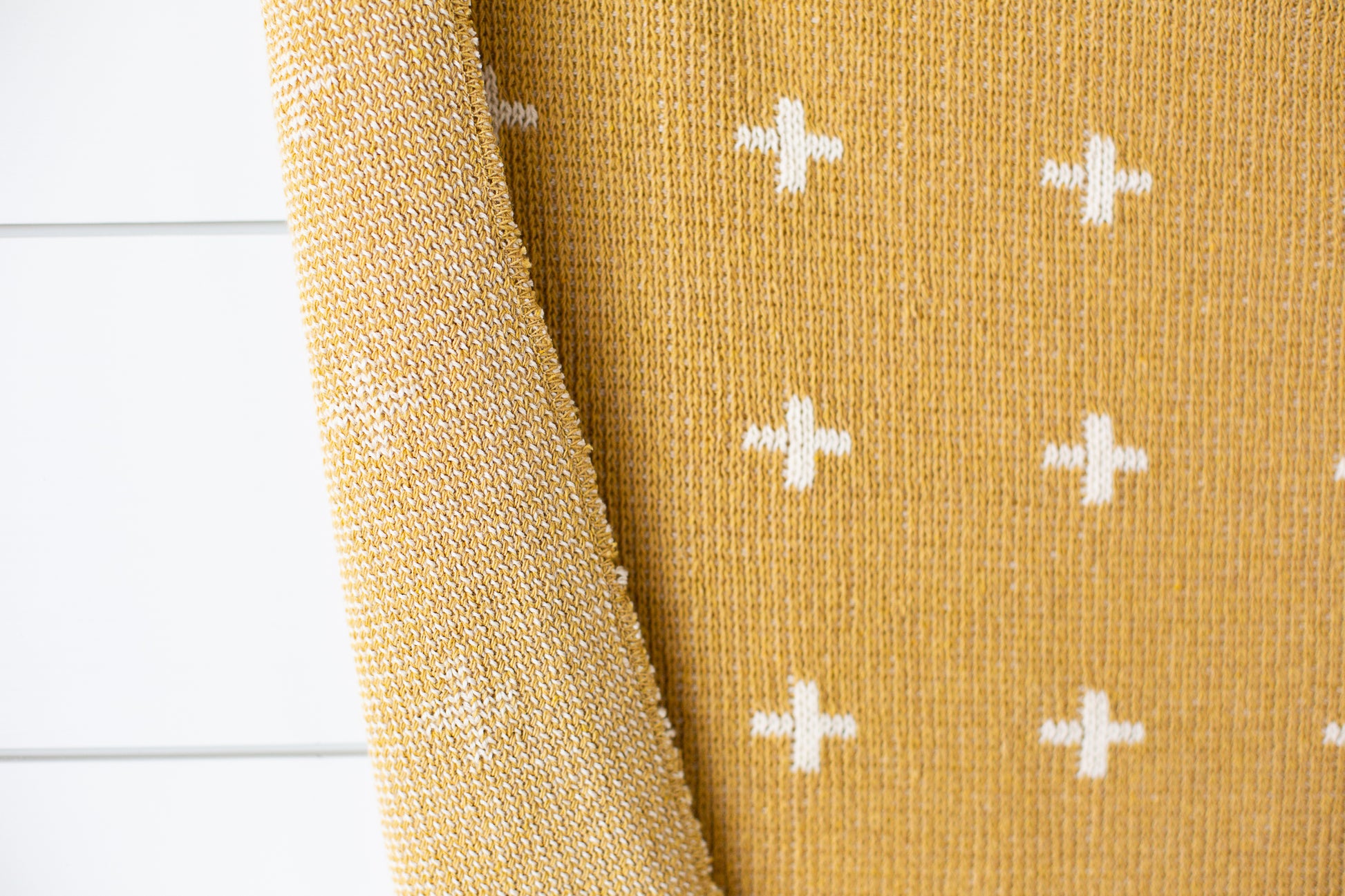 Mini Swiss Cross recycled cotton family throw