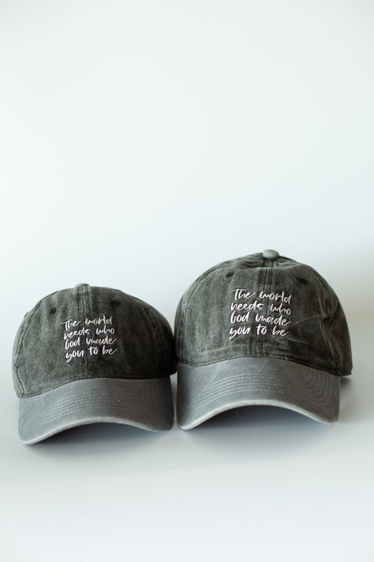 The World Needs Who God Made You to Be black and gray baseball cap