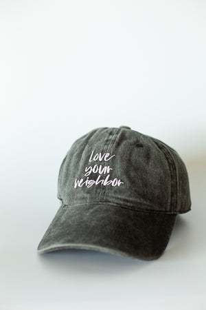 
                  
                    Load image into Gallery viewer, Love your neighbor -  Baseball Cap - Washed Black | 2 sizes
                  
                