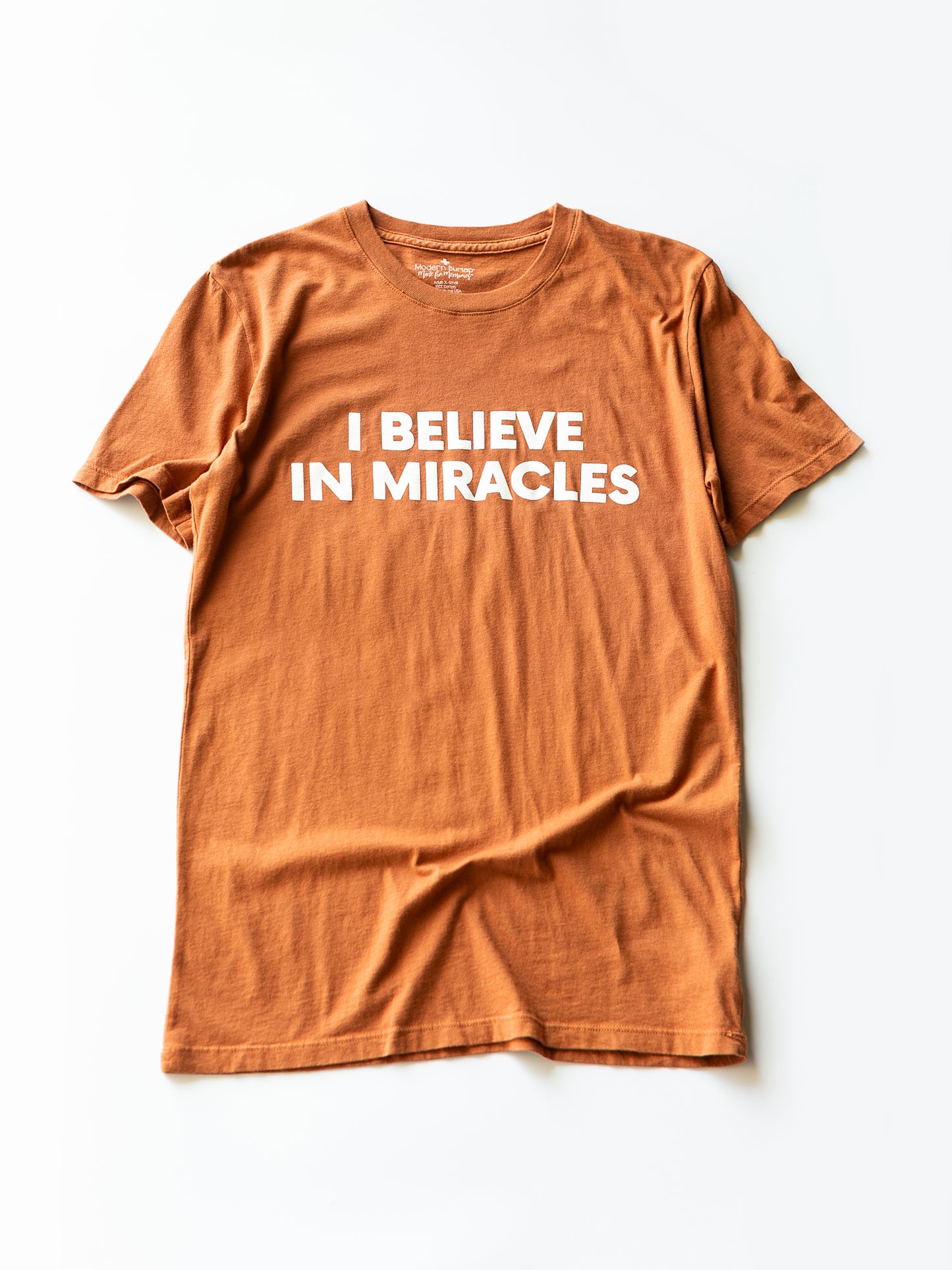 Made in the USA TEE FOR A CAUSE | I believe in miracles Unisex S/S Crewneck Tee - Sunburn