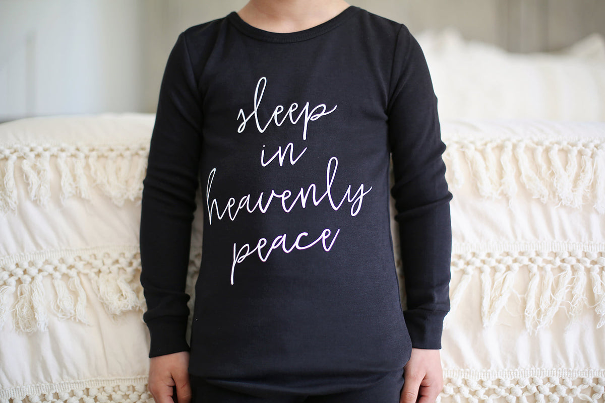 Organic Baby + Kids Pajama Set | Sleep in Heavenly Peace — Close-up of the Sleep in Heavenly Peace lettering