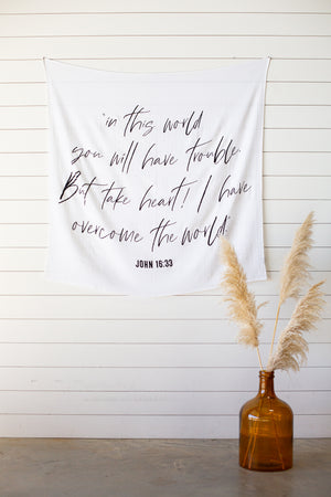 
                  
                    Load image into Gallery viewer, Swaddle Blanket + Wall Art - John 16:33 “I have told you these things, so that in me you may have peace. In this world you will have trouble. But take heart! I have overcome the world.”
                  
                